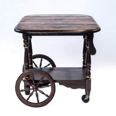 table with large back wheels